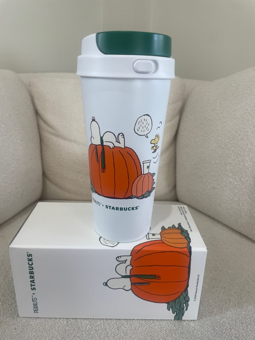 Starbucks White Tumbler with Green Lid and Orange Pumpkin Peanuts Art